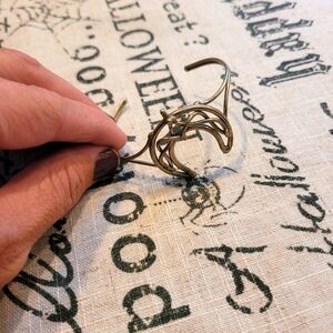 Celtic woven moon bracelet open